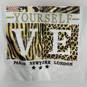 Animal print tshirt with applications.
